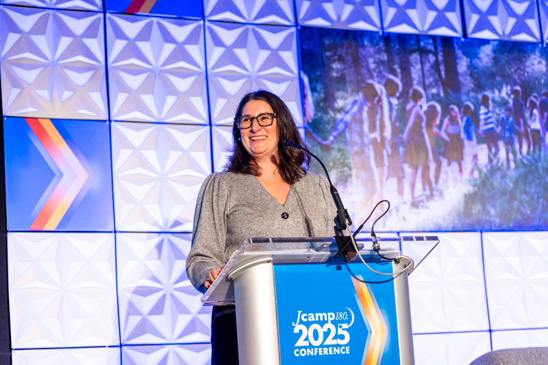 Sarah Eisinger speaking at JCamp 180 annual conference