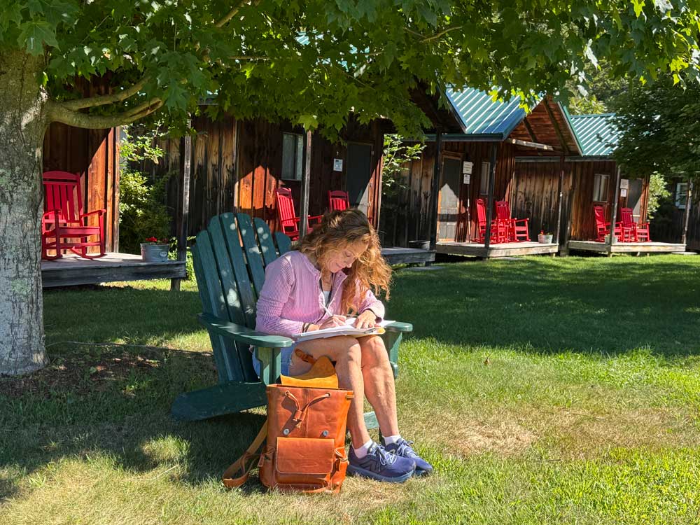 Author Retreat - Author Writing in Book